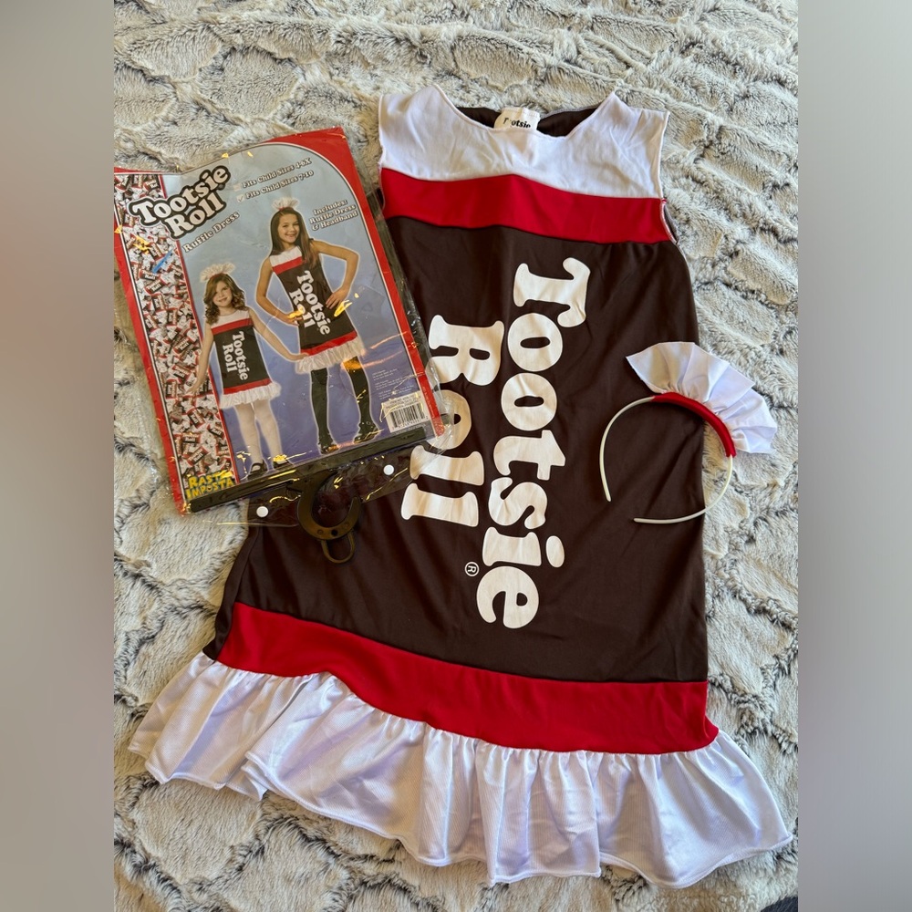Tootsie roll costume fits size 7-10. Comes with a headband